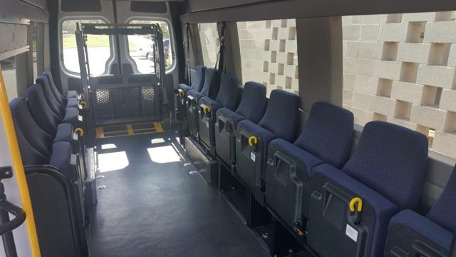 Lift van interior with fold-away seats and open floor